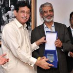 Federal Minister for IT and Telecommunication Syed Amin Ul Haque giving away souvenir to MD NTC Engr. Miraj Gul during inauguration ceremony of NTC SIEM Solution at NTC (National Telecommunication Corporation) Headquarters