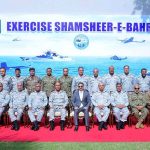 Caretaker Prime Minister Anwaar-ul-Haq Kakar in a group photo with Chief of the Naval Staff Admiral Amjad Khan Niazi, senior officers of tri-services and participants of Pakistan Navy war game "Shamsheer-e-Bahr IX"