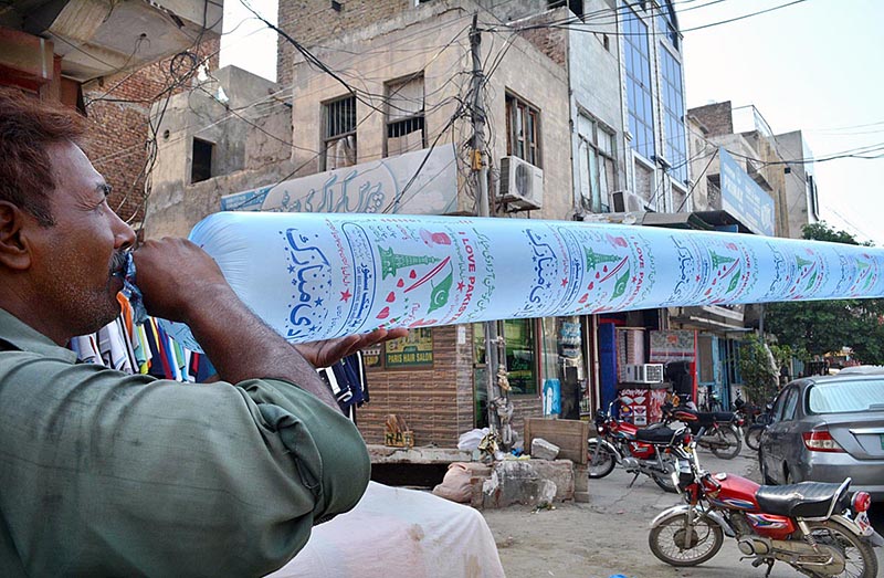 A vendor selling cloths at Muslim Bazar