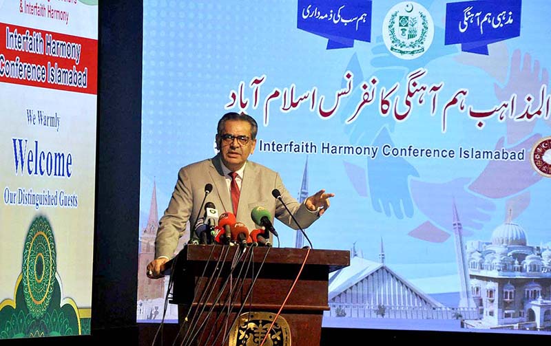 Caretaker Federal Minister for Religious Affairs Aneeq Ahmed addressing during interfaith harmony conference at PNCA