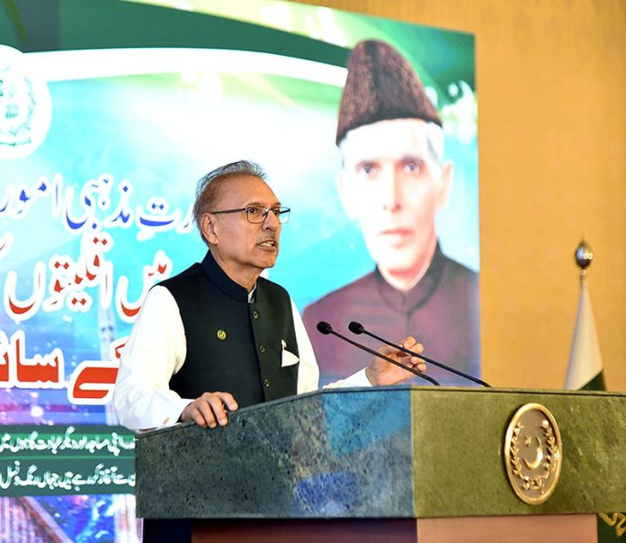 President Dr. Arif Alvi addressing a ceremony in connection with celebration of Minorities' Day event, at Aiwan-e-Sadr