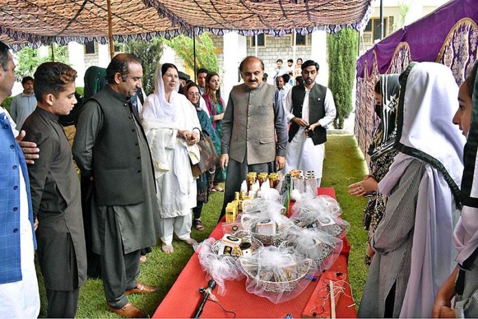 Minister Education GB Ghulam Shahzad Agah along with Minister Social Welfare Gilgit-Baltistan Kulsoom Farman visiting the stalls during the ceremony on the occasion of 77th Independence Day celebration at Women Degree College