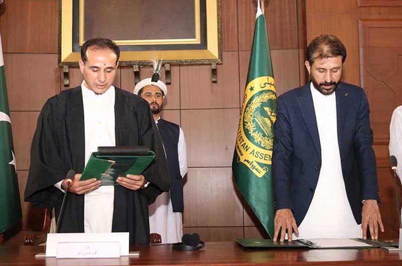 Speaker Gilgit-Baltistan Assembly Nazir Ahmad Advocate administering oath from the newly elected member of GB Assembly Jamil Ahmad at Assembly
