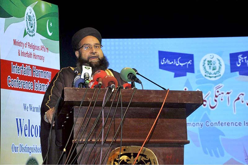 Caretaker Federal Minister for Religious Affairs Aneeq Ahmed addressing during interfaith harmony conference at PNCA