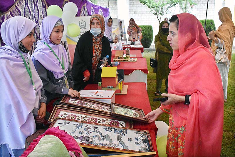 Minister Education GB Ghulam Shahzad Agah along with Minister Social Welfare Gilgit-Baltistan Kulsoom Farman visiting the stalls during the ceremony on the occasion of 77th Independence Day celebration at Women Degree College