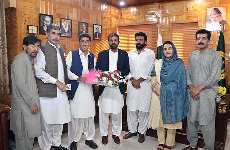 Deputy Speaker Gilgit-Baltistan Assembly Sadia Danish and Minister Finance Gilgit-Baltistan Engineer Ismail giving away flower bouquet to the newly elected member of GB Assembly Jamil Ahmad at Assembly Secretariat
