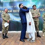 Caretaker Prime Minister Anwaar-ul-Haq Kakar distributing awards among the survivors of Battagram chairlift incident for their bravery at a ceremony.