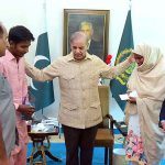 Prime Minister Muhammad Shehbaz Sharif presenting a cheque of 1 million rupees to Jamshed Ali in recognition of his exceptional performance by securing the first position in Matriculation Examination 2023 in Gujranwala Board