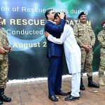 Caretaker Prime Minister Anwaar-ul-Haq Kakar distributing awards among the survivors of Battagram chairlift incident for their bravery at a ceremony