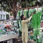 Vendors displaying National flags at G-9 Markaz to attract the customers as the nation starts preparations to celebrate Independence Day in befitting manners