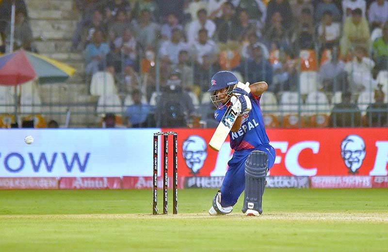 Nepal's player Aasif Sheikh plays a shot during the First cricket match of Asia Cup 2023 between Pakistan and Nepal at Multan Cricket Stadium