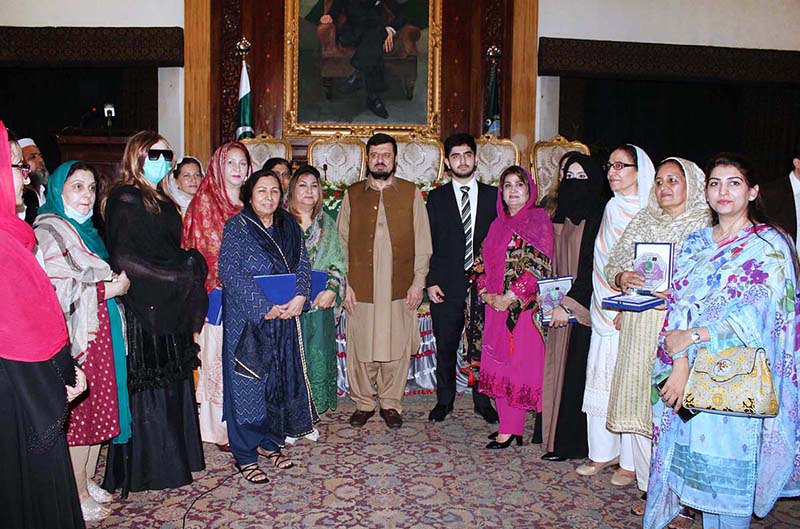 Governor Khyber Pakhtunkhwa Haji Ghulam Ali and WCCI president Azra Jamshed in a group photo with other participants during Women Excellence Award 2023 ceremony at Governor House