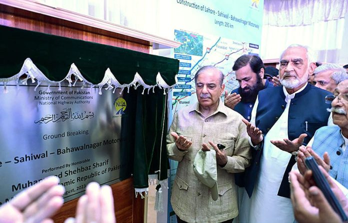 Prime Minister Muhammad Shehbaz Sharif unveils a plaque to mark the ground breaking of Lahore-Sahiwal-Bahawalnagar Motorway in Kasur