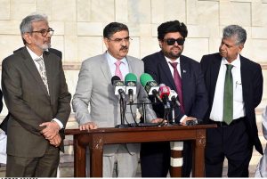 Caretaker Prime Minister Anwaar-ul-Haq Kakar giving remarks after laying a floral wreath at the Mausoleum of Quaid e Azam Muhammad Ali Jinnah, Governor and Chief Minister Sindh as well as Federal Minister for Information & Broadcasting are also present