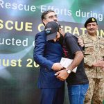 Caretaker Prime Minister Anwaar-ul-Haq Kakar distributing awards among the survivors of Battagram chairlift incident for their bravery at a ceremony