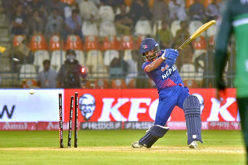 Nepal's player Aasif Sheikh plays a shot during the First cricket match of Asia Cup 2023 between Pakistan and Nepal at Multan Cricket Stadium