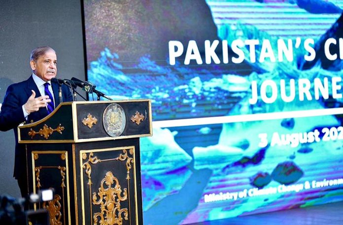 Prime Minister Muhammad Shehbaz Sharif addressing during the "Pakistan's Climate Journey" Conference.