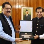 Speaker National Assembly Raja Pervez Ashraf presenting souvenir to Federal Minister for National Food Security, Chaudhary Tariq Bashir Cheema at Parliament House