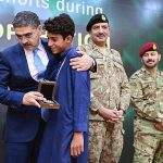 Caretaker Prime Minister Anwaar-ul-Haq Kakar distributing awards among the survivors of Battagram chairlift incident for their bravery at a ceremony.