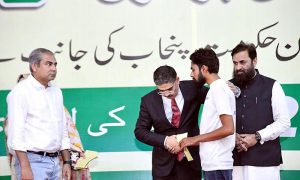 Caretaker Prime Minister Anwaar-ul-Haq Kakar distributes cheques of 2 million rupees each to individuals from the Christian community whose residences were damaged due to mob violence in Tehsil Jaranwala