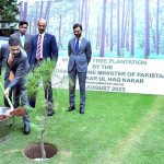 Caretaker Prime Minister Anwaar-ul-Haq Kakar plants a sapling to launch monsoon tree plantation as part of the "Green Pakistan Programme 2023