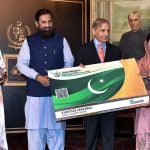 Prime Minister Muhammad Shehbaz Sharif distributing PM's Health Insurance Cards among Film Industry Workers