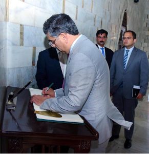 Caretaker Prime Minister Anwaar-ul-Haq Kakar recording his remarks in visitors' book at Mausoleum of the Father of the Nation, Quaid e Azam Muhammad Ali Jinnah