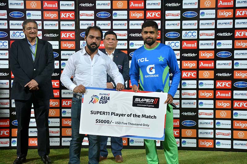 Pakistan’s, Babar Azam receives Player of the Match as he made 151 runs during the first cricket match of the Asia Cup 2023 between Pakistan and Nepal at Multan Cricket Stadium