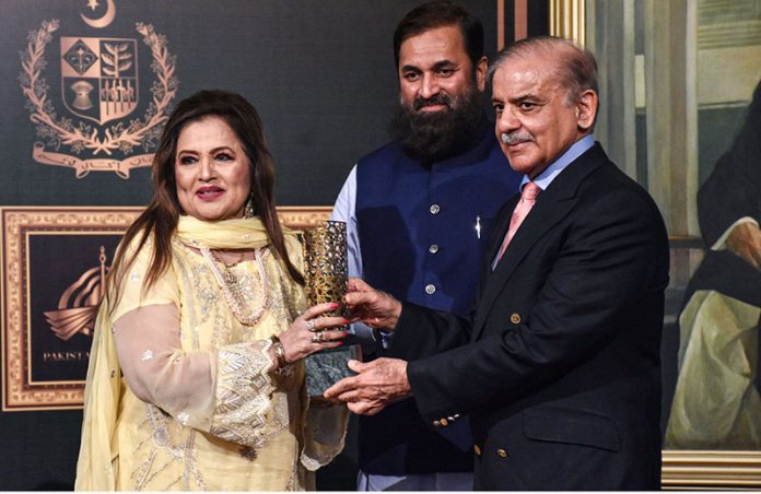 Prime Minister Shahbaz Sharif distributing award among the best performing Actors, Producers and Directors from Pakistan's Film Industry