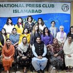 Speaker National Assembly Raja Pervez Ashraf in a group photo with participants of the reception to pay tribute to '' The Women Parliamentarians in Strengthening Democracy'' at National Press Club