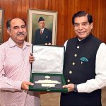 Speaker National Assembly Raja Pervez Ashraf presenting souvenir to Member National Assembly Dr. Muhammad Afzal Dhandla at Parliament House