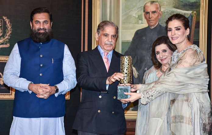 Prime Minister Shahbaz Sharif distributing award among the best performing Actors, Producers and Directors from Pakistan's Film Industry