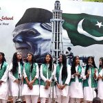 Students are singing National song during the ceremony organized at Radio Pakistan Road on the occasion of 77th Independence Day celebration