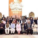 President Dr. Arif Alvi in a group photo with the members of Sargodha Chamber of Commerce & Industry, at Aiwan-e-Sadr