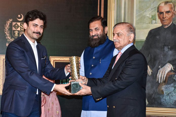 Prime Minister Shahbaz Sharif distributing award among the best performing Actors, Producers and Directors from Pakistan's Film Industry