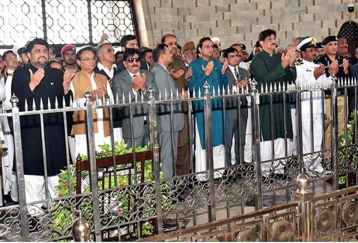 Sindh Governor Mohammed Kamran Khan Tessori and Chief Minister Syed Murad Ali Shah offering Fateha at the Quaid-e-Azam mausoleum on the occasion of 77th Independence Day celebration