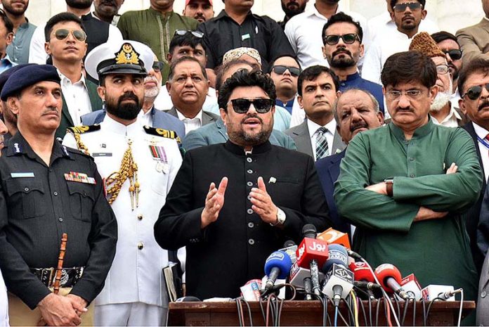Sindh Governor Mohammed Kamran Khan Tessori and Chief Minister Syed Murad Ali Shah talking to media persons at the Quaid-e-Azam mausoleum on the occasion of 77th Independence Day celebration