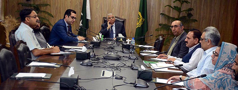 Caretaker Federal Minister for Planning and Development Muhammad Sami Saeed chairing a meeting to review social sector initiatives