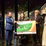 Federal Minister for Information and Broadcasting Marriyum Aurangzeb along with Secretary of Information and Broadcasting & Managing Director PTV Sohail Ali Khan handing over Health Card to Senior Actor Ayaz Khan at Icon Awards 2023 ceremony