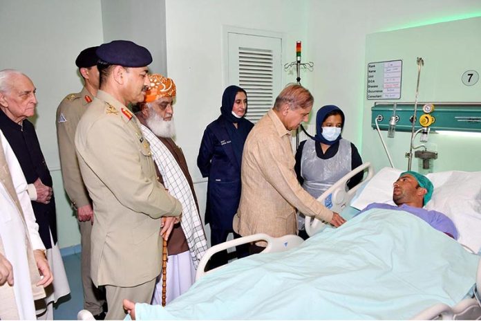 Prime Minister Muhammad Shehbaz Sharif and Chief of Army Staff General Syed Asim Munir visiting those injured in Khaar (Bajaur) suicide blast in CMH Peshawar