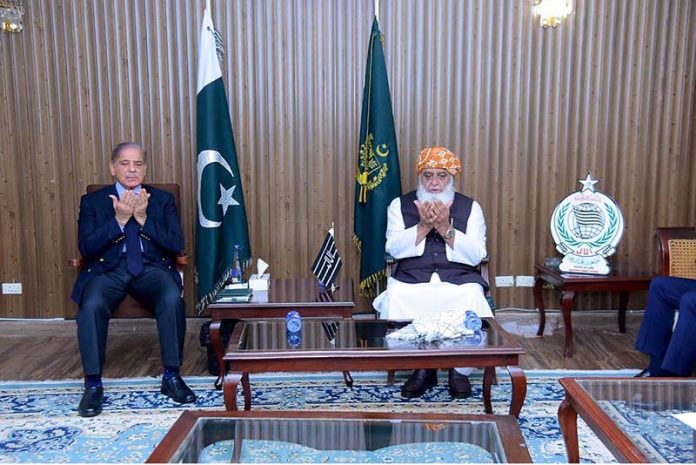Prime Minister Muhammad Shehbaz Sharif offering condolences to President JUI-F for the party workers who were martyred in a suicide attack on JUI workers convention in Khar, Bajaur