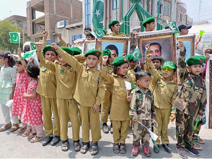 Children of Private Educational Institution Millat Islamia Cadet School are celebrating Independence Day in uniform at Allahwala Chowk