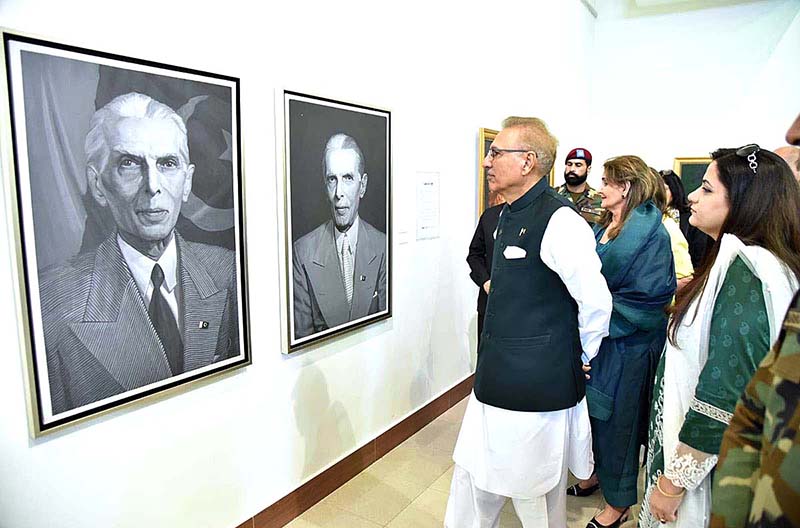 President Dr. Arif Alvi viewing a painting exhibition to pay tribute to Quaid-e-Azam Muhammad Ali Jinnah on Pakistan's Independence Day