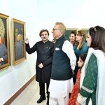 President Dr. Arif Alvi viewing a painting exhibition to pay tribute to Quaid-e-Azam Muhammad Ali Jinnah on Pakistan's Independence Day