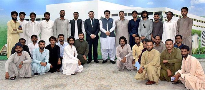 Chairman Senate, Muhammad Sadiq Sanjrani in a group photo with the delegation of the students and faculty members of the University Of Makran, Panjgur Balochistan at Parliament House
