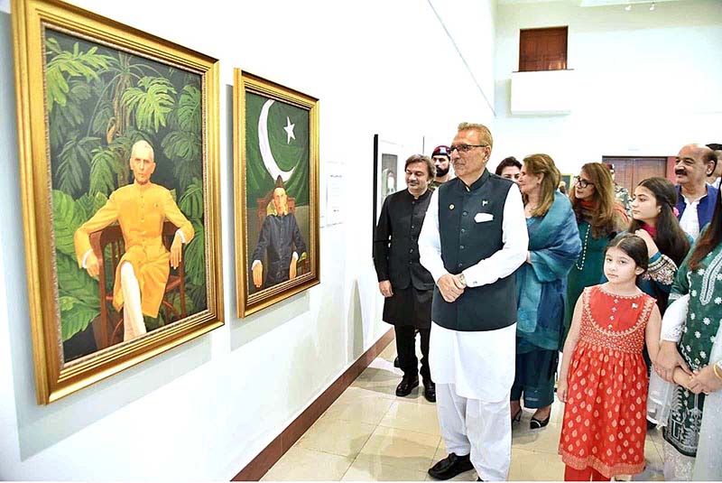 President Dr. Arif Alvi viewing a painting exhibition to pay tribute to Quaid-e-Azam Muhammad Ali Jinnah on Pakistan's Independence Day