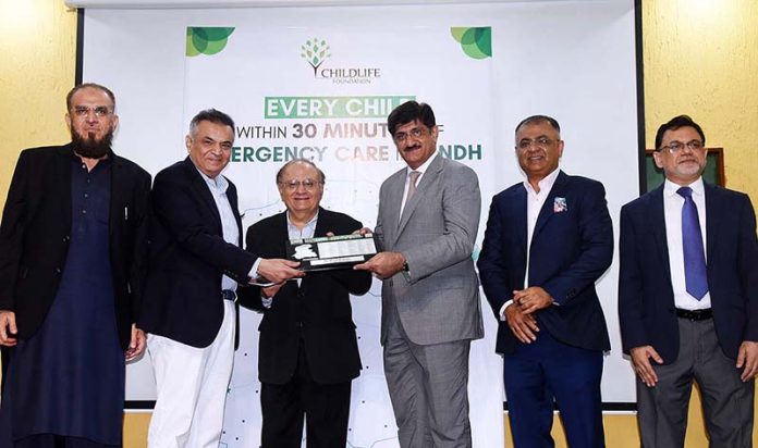 Chairman ChildLife Foundation Iqbal Adamjee, Trustee Suhail Tabba, Ahsan Rabbani and others present a memento to Sindh Chief Minister Syed Murad Ali Shah at their program at Dr. Ruth K. M. Pfau Civil Hospital.
