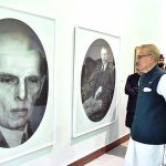 President Dr. Arif Alvi viewing a painting exhibition to pay tribute to Quaid-e-Azam Muhammad Ali Jinnah on Pakistan's Independence Day