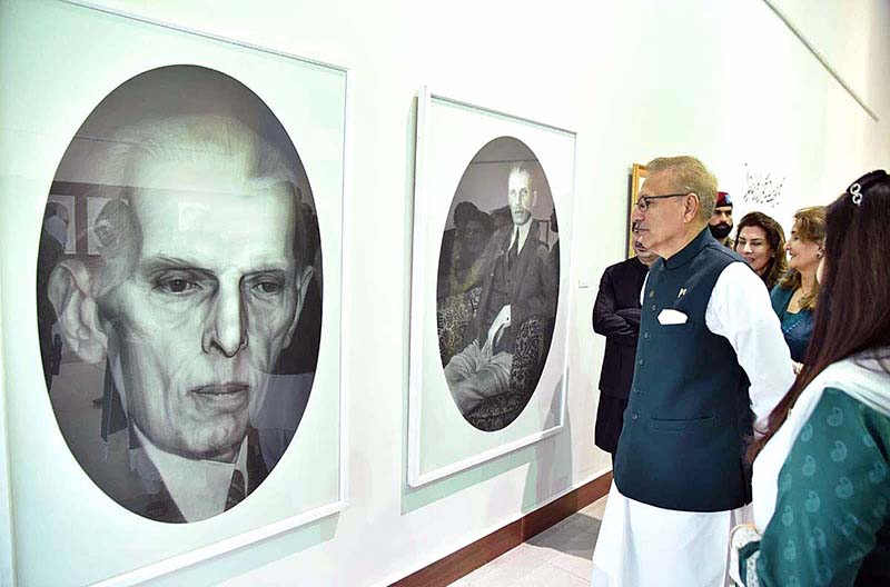 President Dr. Arif Alvi viewing a painting exhibition to pay tribute to Quaid-e-Azam Muhammad Ali Jinnah on Pakistan's Independence Day
