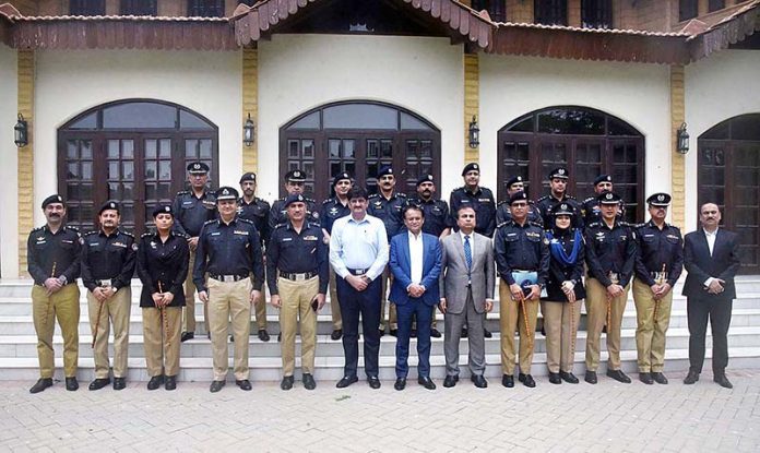 A group photo of Sindh chief Minister Syed Murad Ali Shah with newly promoted Police Officers, PSP, to grade BS-19